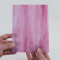 Video of the Pink Purple glass plate in translucent pink, 15x19cm, held up and tilted to show its pattern and transparency