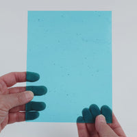 Video of the pale Light Turquoise glass plate in translucent turquoise, 15x19cm, held up and tilted to show its pattern and transparency